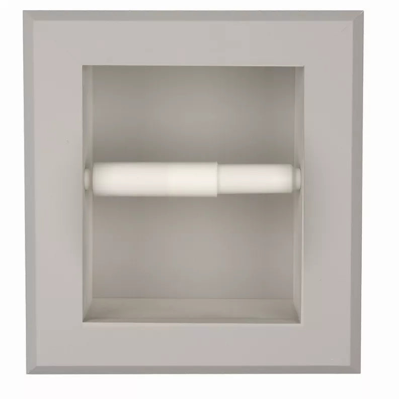 Recessed toilet paper holder with a square wall niche, shown empty