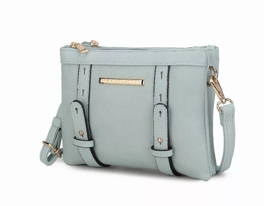 Light blue multi-compartment crossbody bag with top zipper, gold hardware, and adjustable strap
