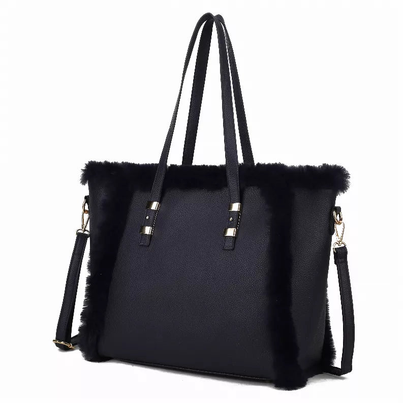 Women's vegan leather tote bag with faux fur trim, top handles and shoulder strap.