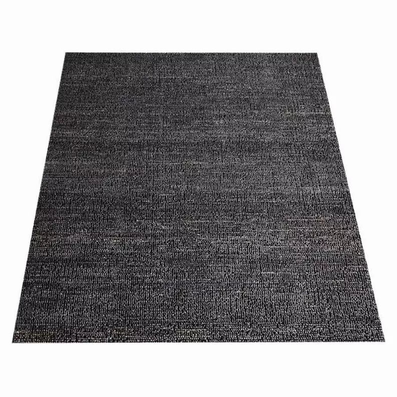 Charcoal solid hand-woven jute area rug with flat woven texture
