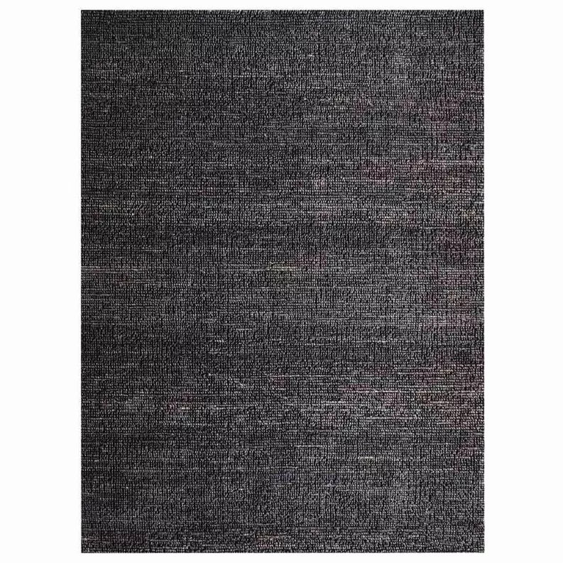 Charcoal solid hand-woven jute area rug, full view with uniform weave
