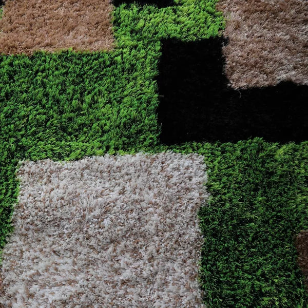 Square shag area rug with geometric blocks in green, white, brown, and black