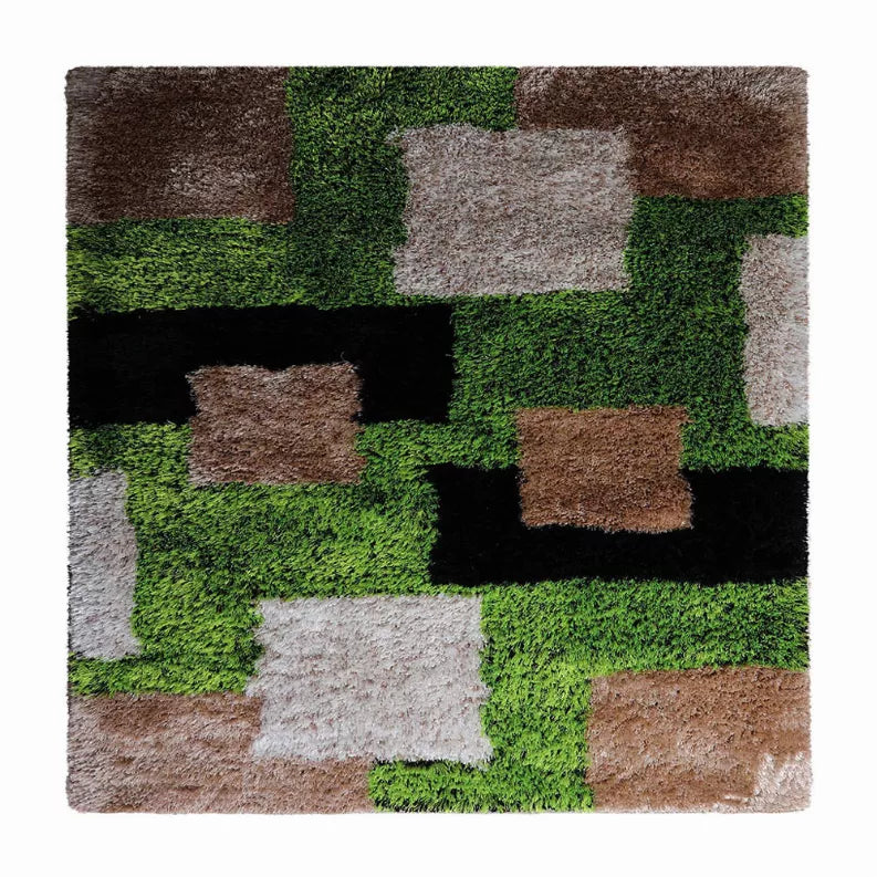 Square shag geometric rug with green, gray, brown, black, and white square blocks.