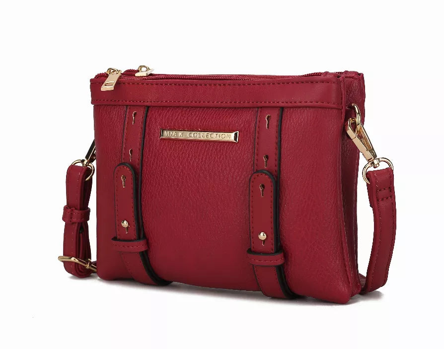 Red multi-compartment crossbody bag with front flap, gold hardware, and zip closure