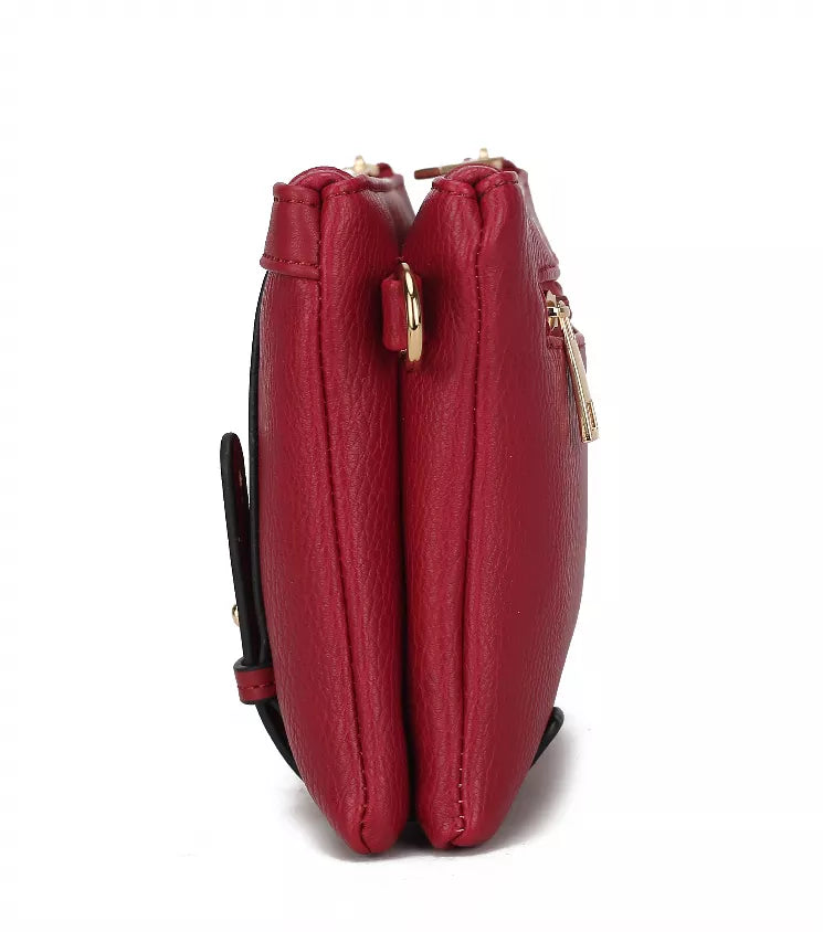 Red crossbody bag back view with gold zipper pulls and attached adjustable strap