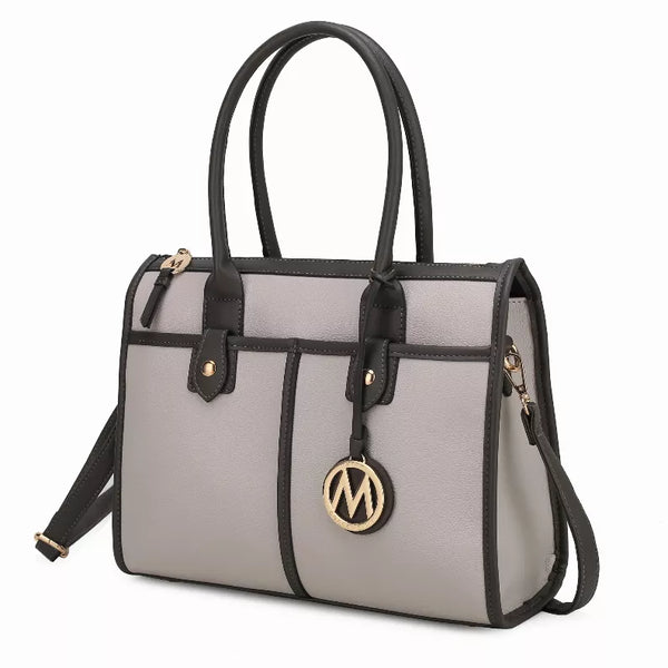 Livia satchel in light gray with black trim, front pockets, gold logo charm