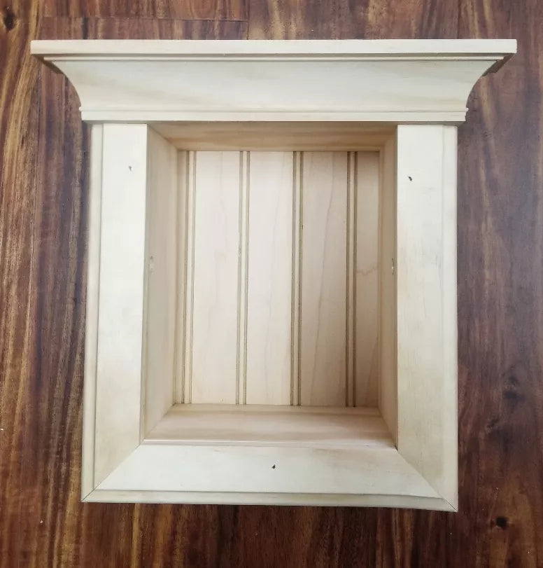 Recessed solid wood toilet paper holder with open front frame, light natural finish