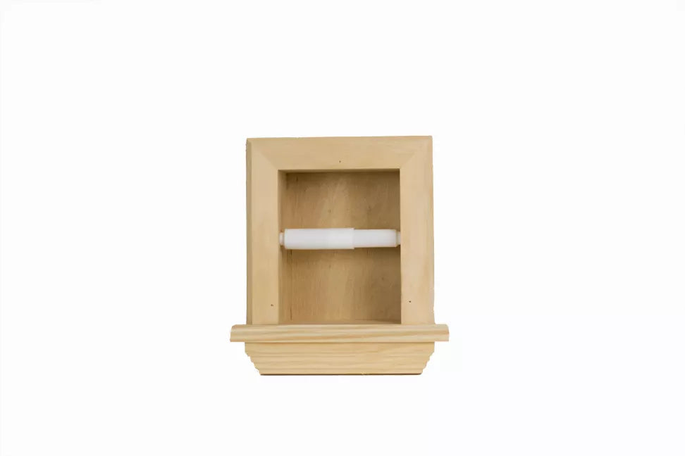 Recessed solid wood toilet paper holder with light wood frame and a white paper roll inside.