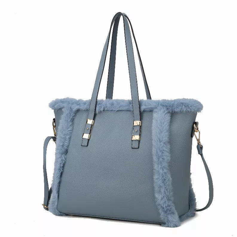 Women's tote bag with faux fur trim, light blue vegan leather, top handles and crossbody strap