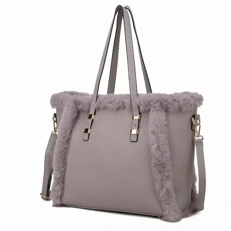 Vegan leather tote bag with lavender faux-fur trim, two handles and side strap