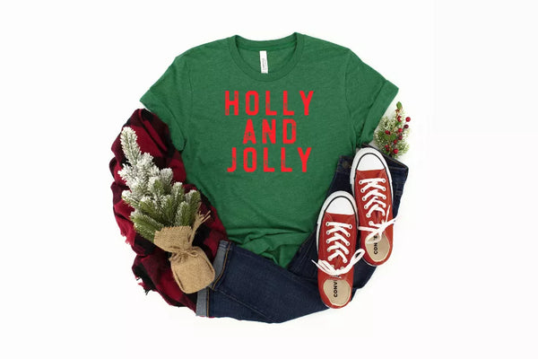 Green crewneck T-shirt with red 'HOLLY AND JOLLY' lettering on chest