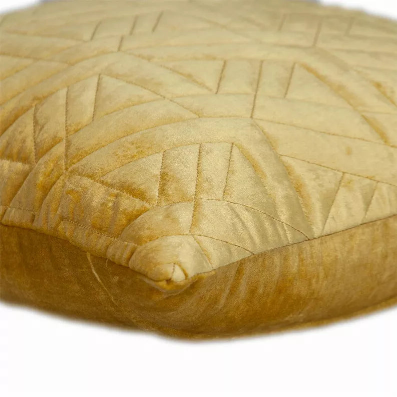 Mustard yellow quilted throw pillow with raised geometric stitch detail
