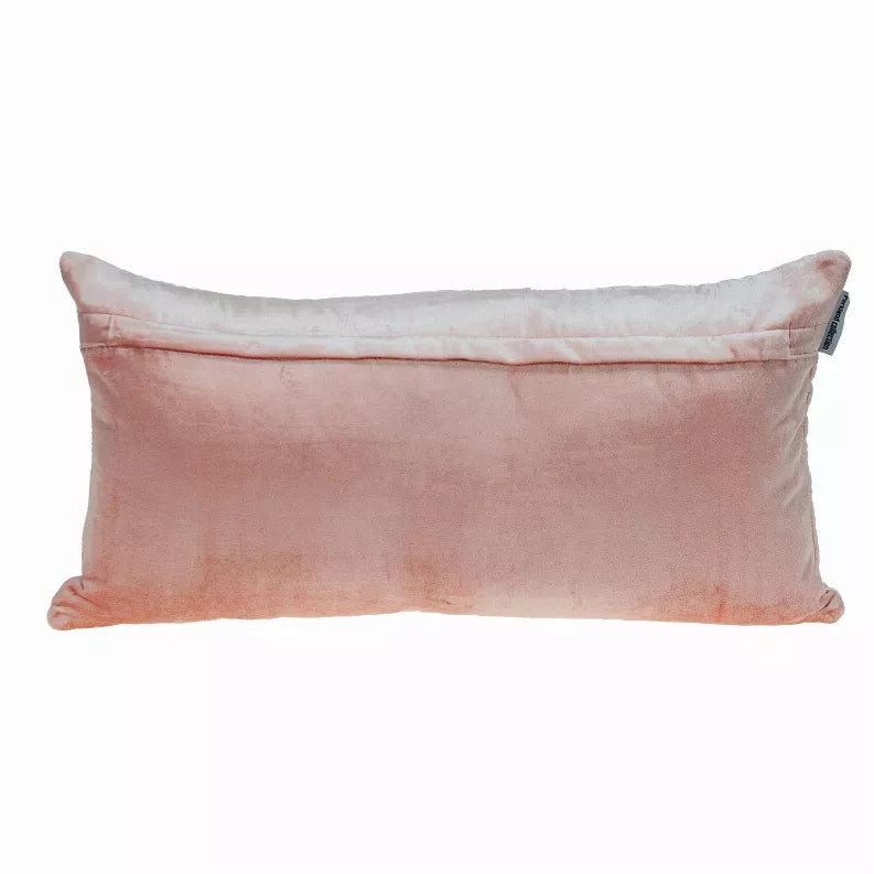 Salmon-pink velvety lumbar pillow with plain front and visible stitched border