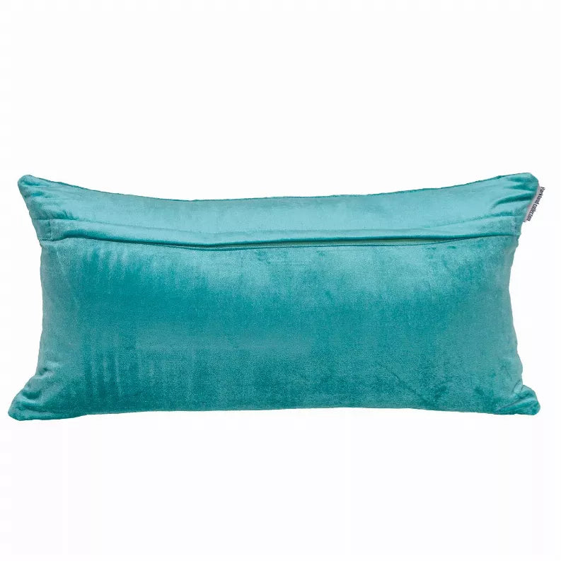 Turquoise lumbar-style quilted throw pillow with piped edges, shown against a plain background.