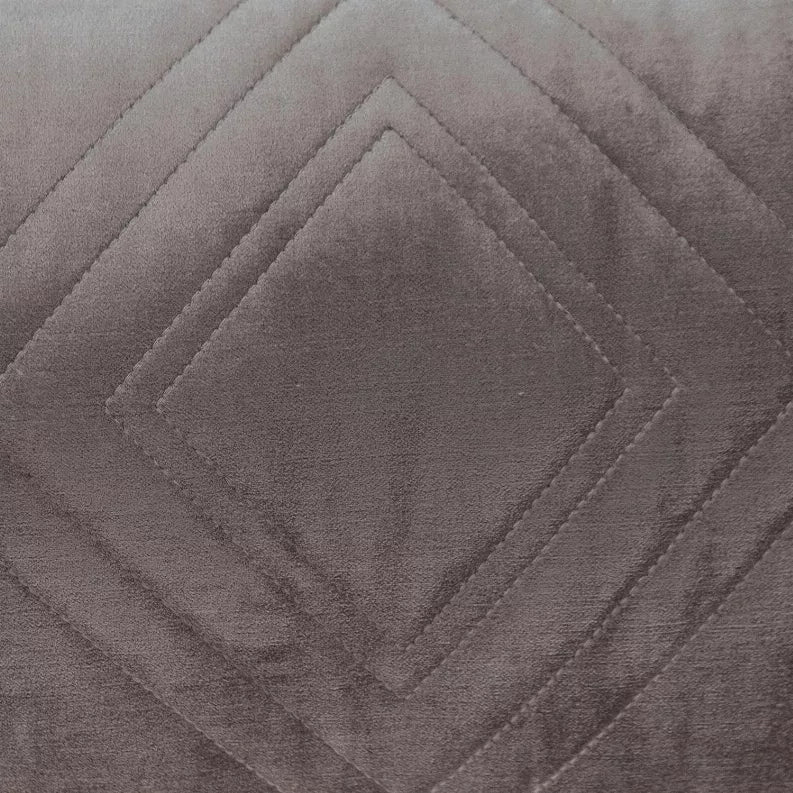 Gray diamond-quilt stitching detail on rectangular throw pillow