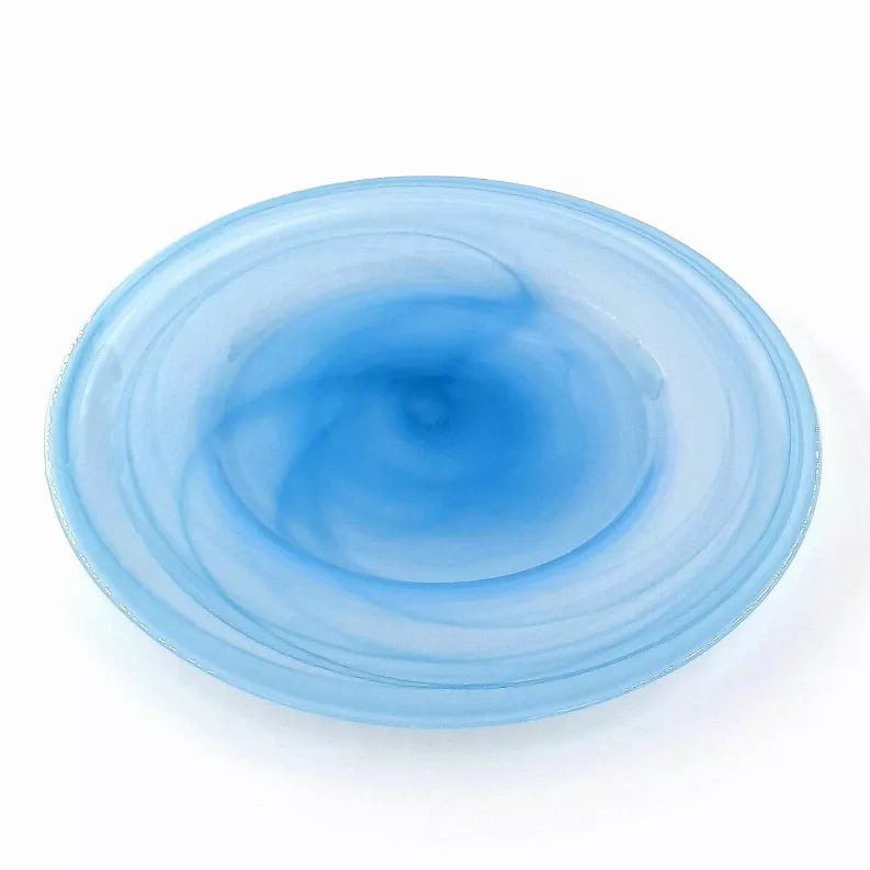 Light blue glass charger plate with smooth rim and concentric swirl patterns, 13-inch.