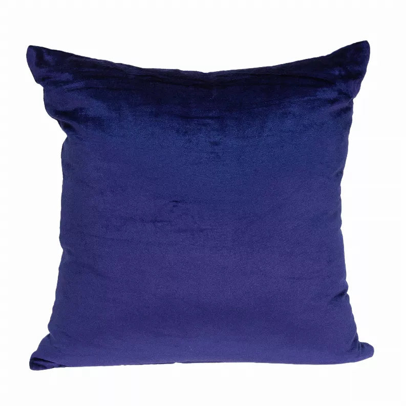 Royal blue solid throw pillow with stitched edges and velvet-like textured fabric.