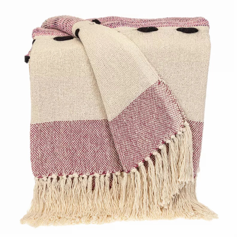 Beige and mauve woven throw blanket with patchwork pattern and long cream fringe