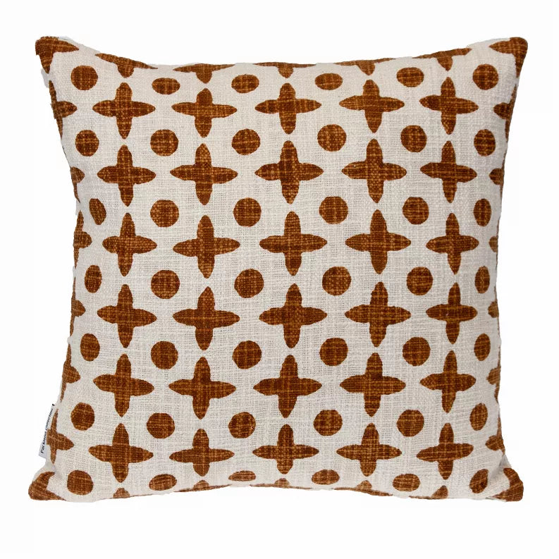 Front view square pillow cover with repeating brown crosses and dots on cream