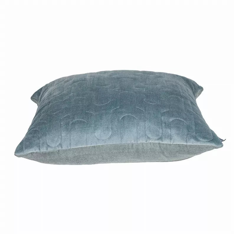 Gray quilted throw pillow with U-shaped stitch quilting and piped edge