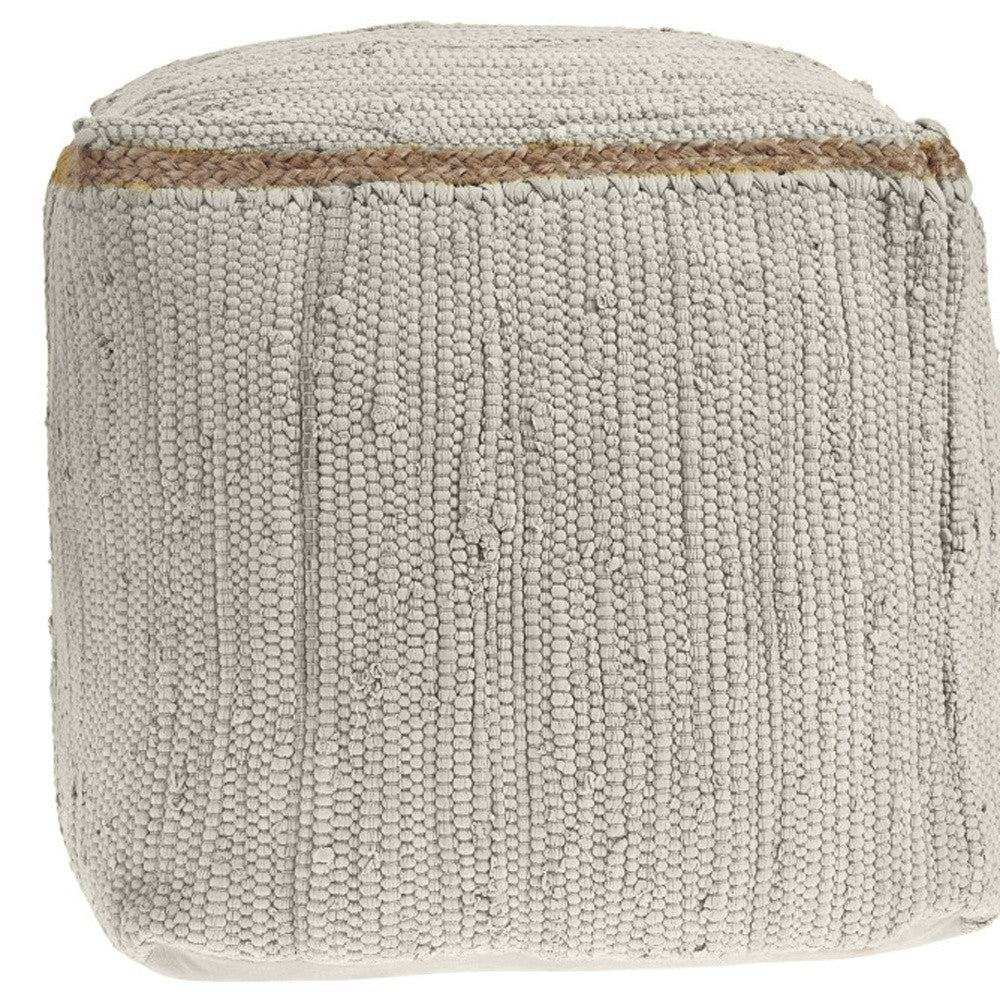 Gray textured cotton pouf with braided jute detailing, perfect for modern home decor.