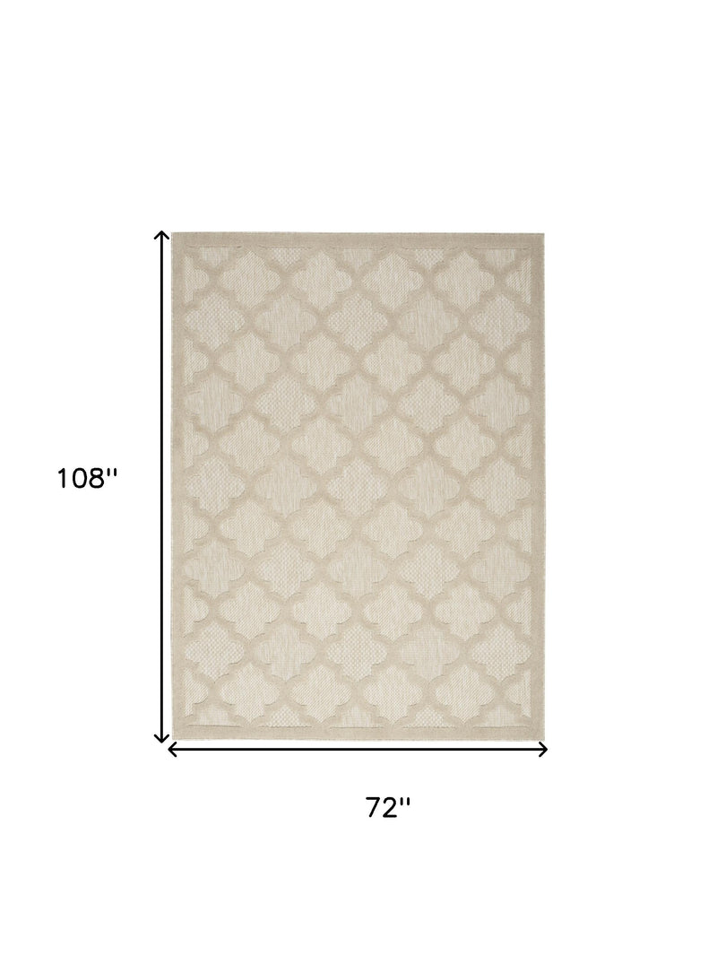 Rug size 72 x 108 in with cream trellis quatrefoil pattern