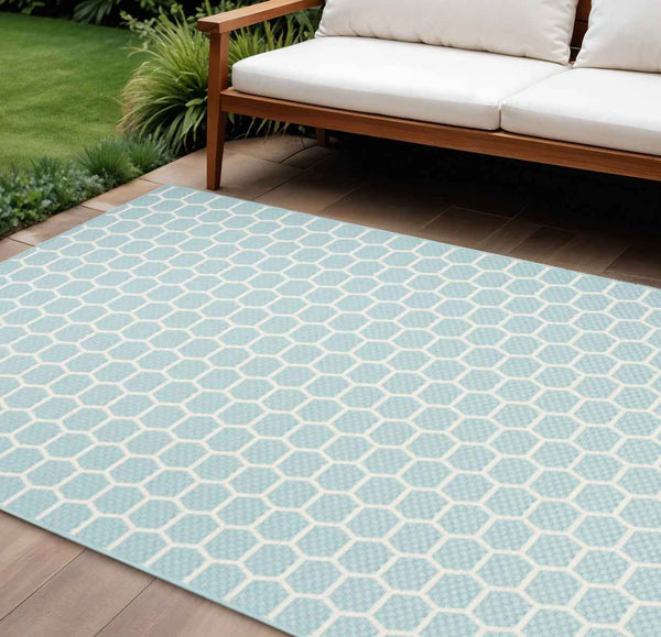 6' X 9' Aqua And Ivory Geometric Indoor Outdoor Area Rug