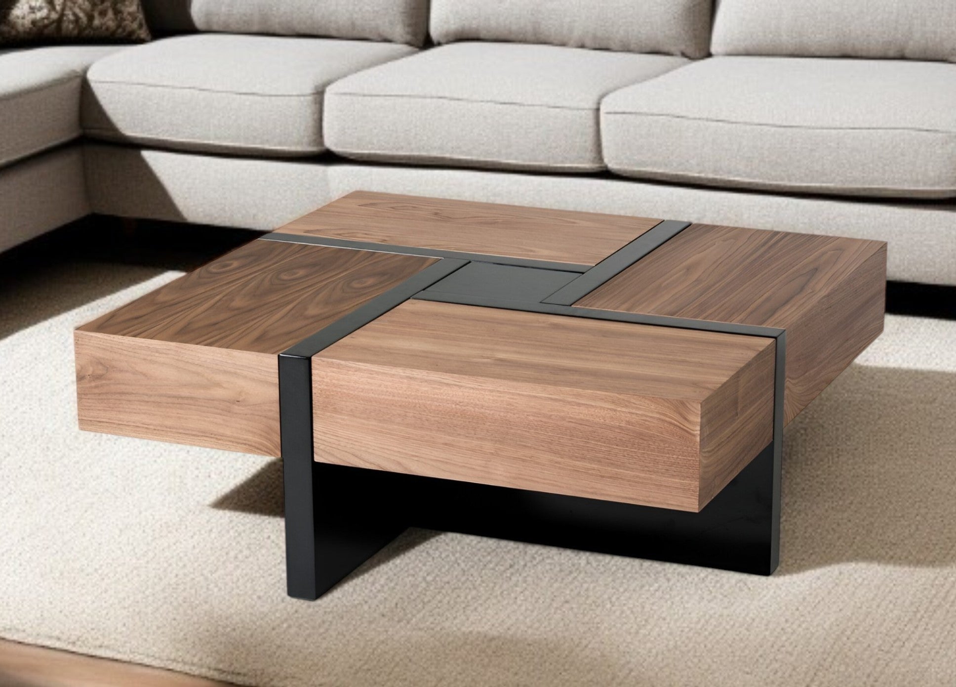 Brown and black wood square coffee table with four drawers and black legs on a sofa