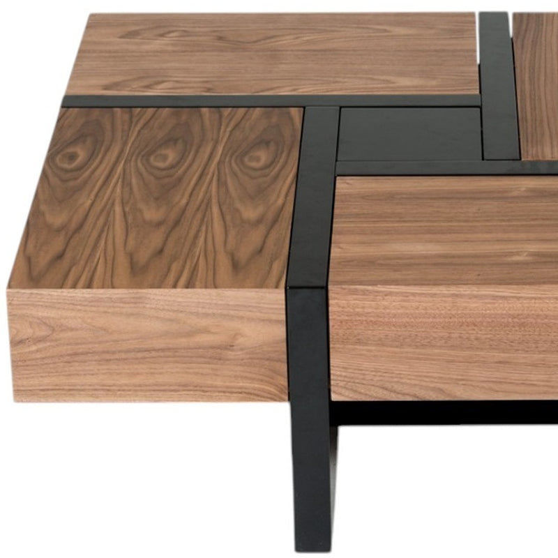 Wood coffee table close-up of drawer fronts, black frame, dark top insert