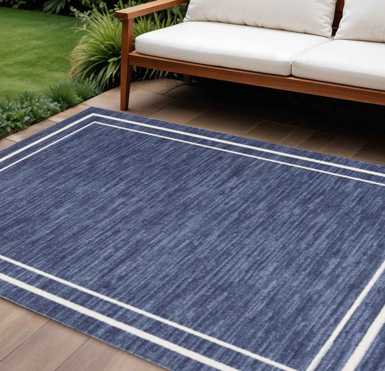 7' X 10' Navy Blue And Ivory Indoor Outdoor Area Rug