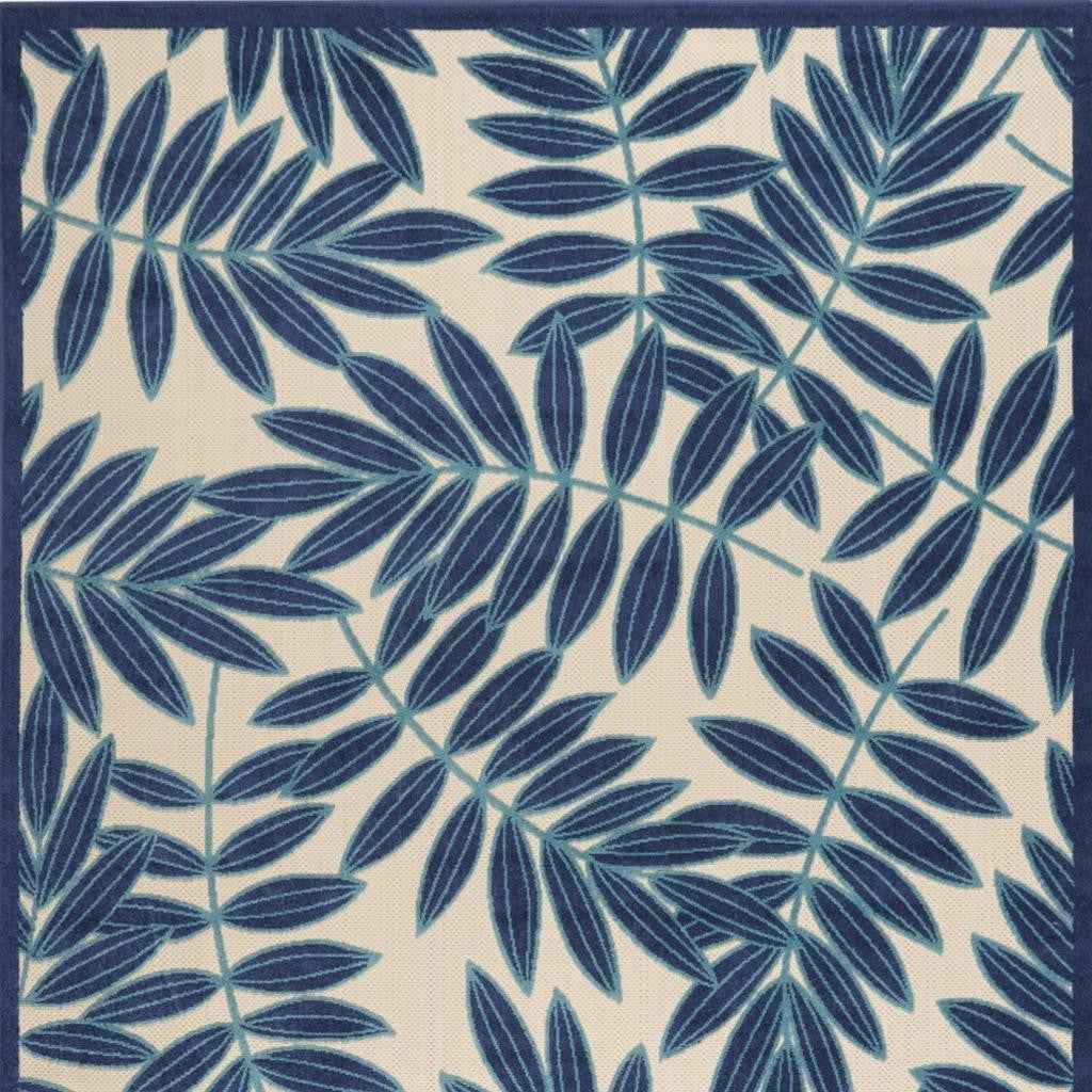 6' X 9' Blue And Ivory Floral Indoor Outdoor Area Rug