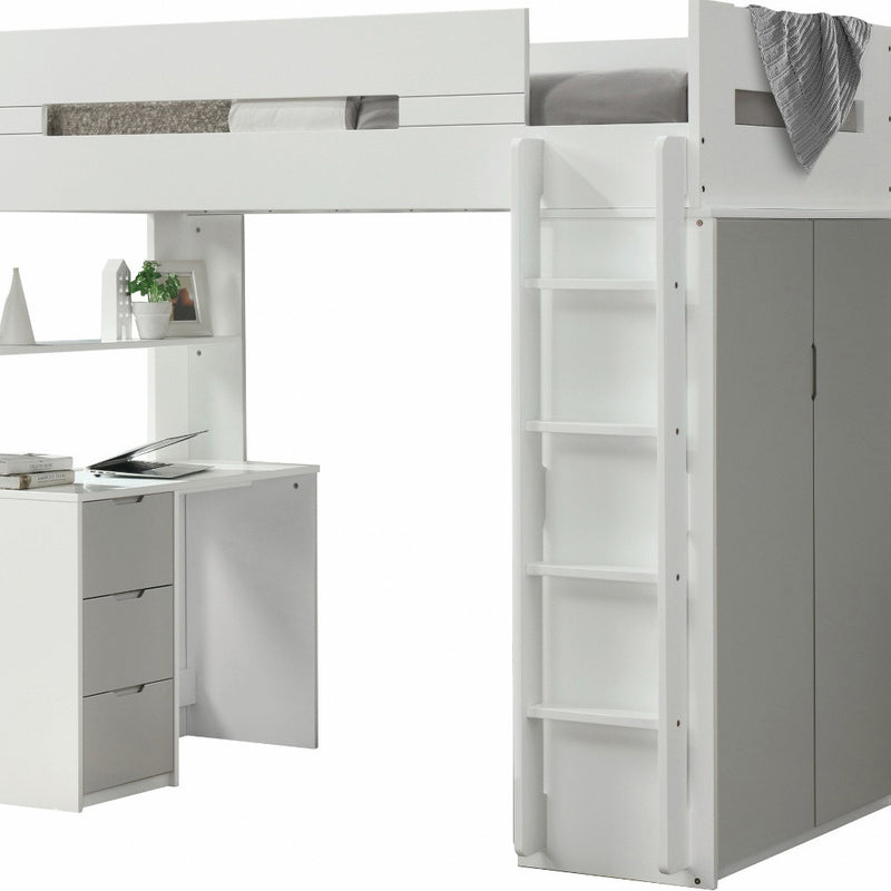 Twin loft bed with open step shelves, gray side cabinet, and attached desk