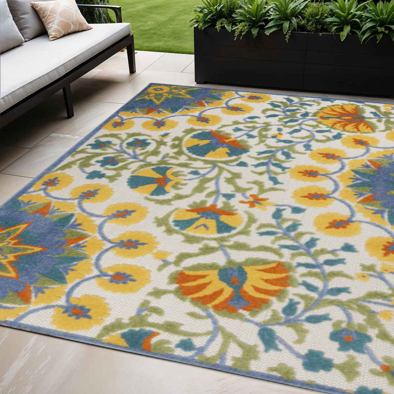 5' X 8' Ivory And Blue Floral Indoor Outdoor Area Rug