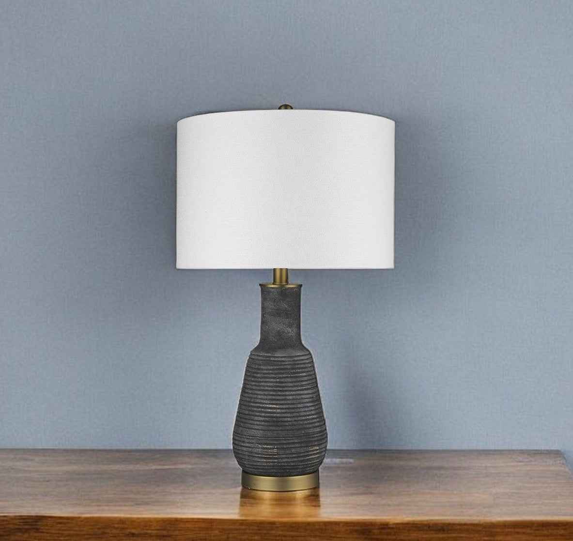 26" Distressed Black and Gold Ceramic Table Lamp With White Drum Shade