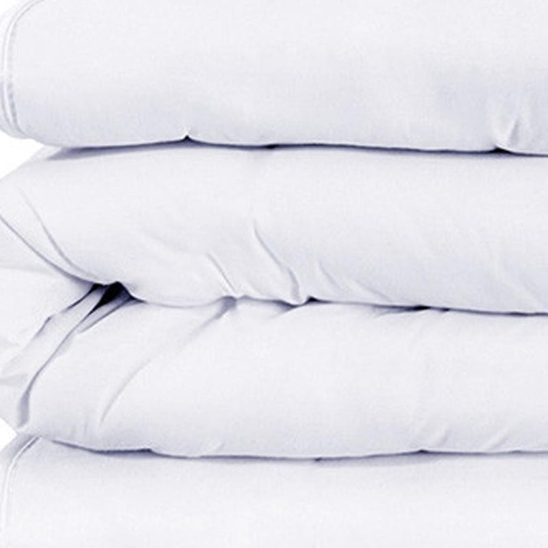 White duvet cover set close-up of folded fabric and stitched seam lines