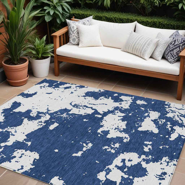 8' X 10' Navy Blue And Ivory Abstract Washable Indoor Outdoor Area Rug