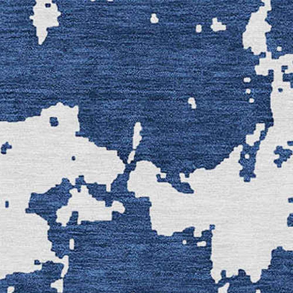 8' X 10' Navy Blue And Ivory Abstract Washable Indoor Outdoor Area Rug