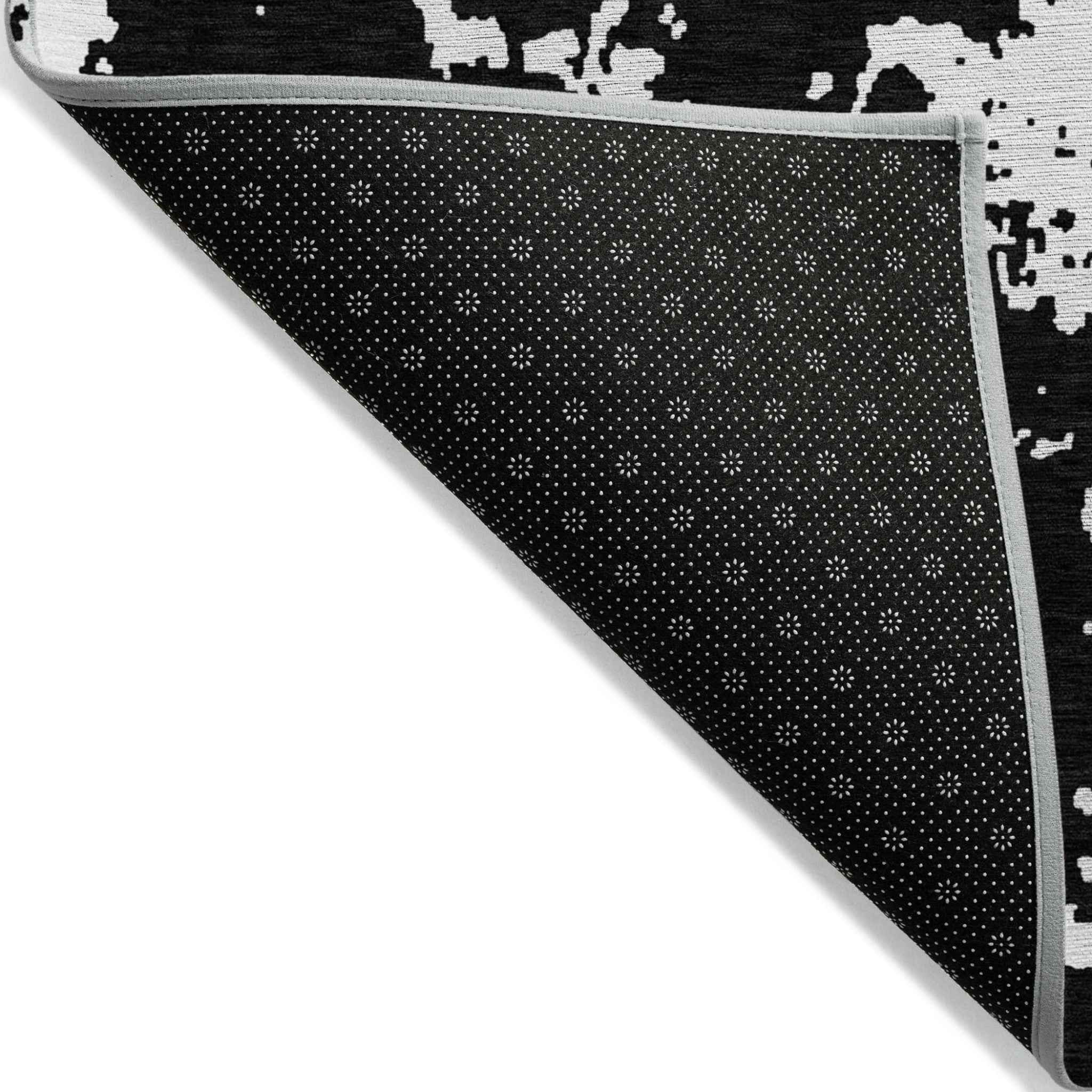 8' X 10' Black And Ivory Abstract Washable Indoor Outdoor Area Rug