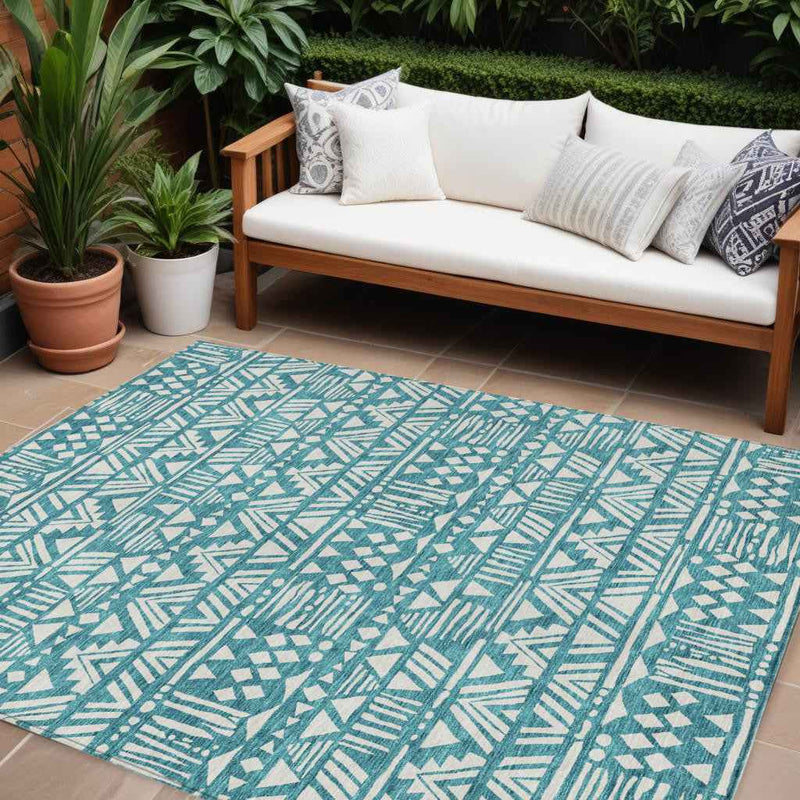 10' X 14' Teal Blue And Ivory Southwestern Washable Indoor Outdoor Area Rug