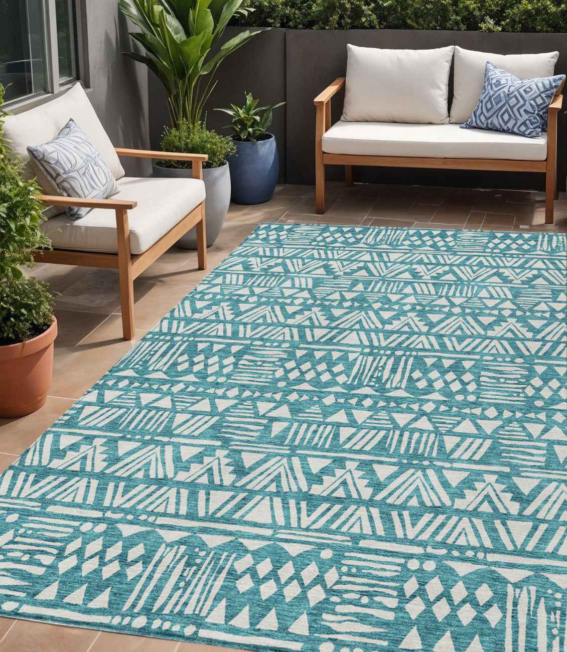 5' X 8' Teal Blue And Ivory Southwestern Washable Indoor Outdoor Area Rug