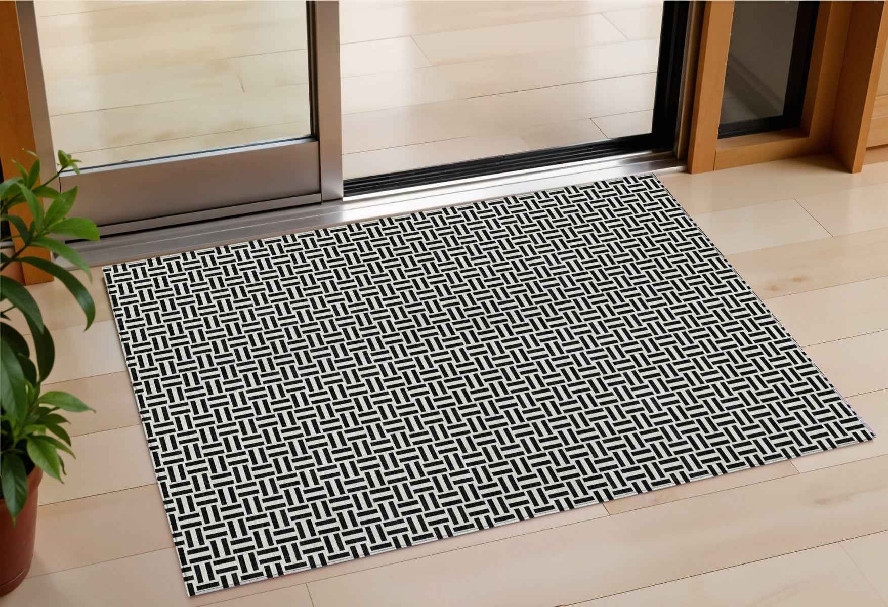 3' X 5' Black And Ivory Geometric Washable Indoor Outdoor Area Rug