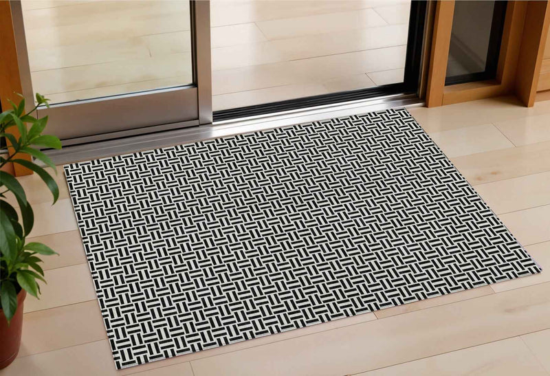 3' X 5' Black And Ivory Geometric Washable Indoor Outdoor Area Rug