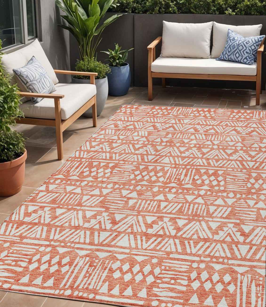 5' X 8' Coral And Ivory Southwestern Washable Indoor Outdoor Area Rug