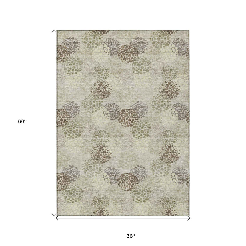 3' X 5' Beige Green And Ivory Polka Dot Washable Indoor Outdoor Area Rug