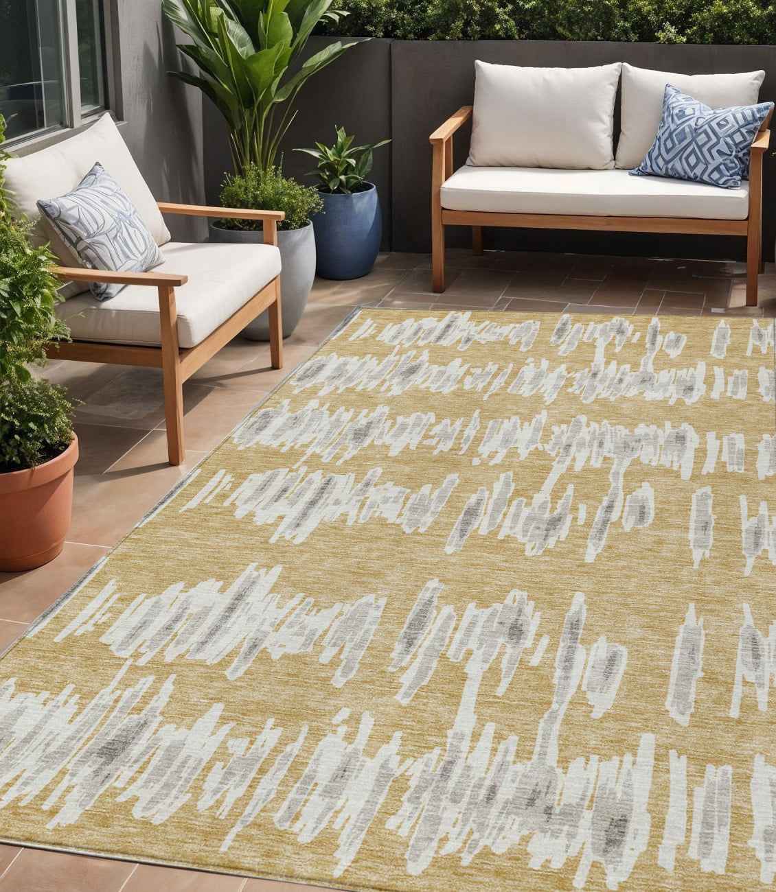 5' X 8' Gold Gray And Ivory Striped Washable Indoor Outdoor Area Rug