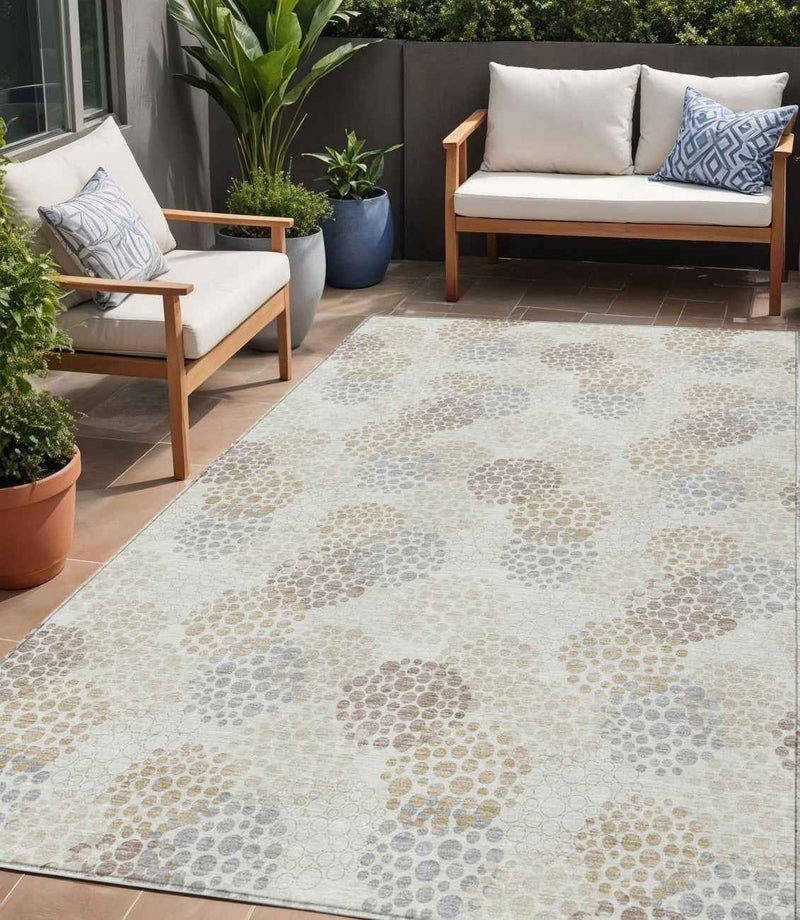 5' X 8' Ivory Brown And Gray Polka Dot Washable Indoor Outdoor Area Rug