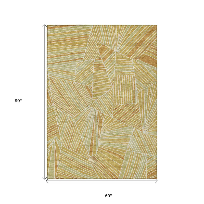 5' X 8' Gold Copper And Brown Geometric Washable Indoor Outdoor Area Rug