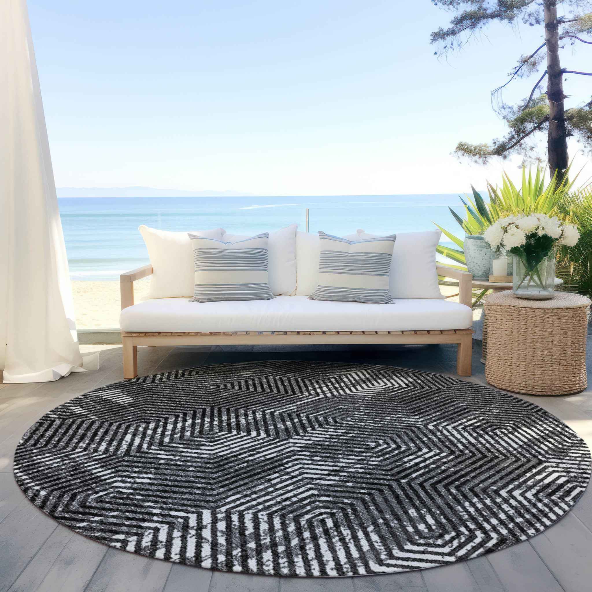 8' Black And Ivory Round Geometric Washable Indoor Outdoor Area Rug