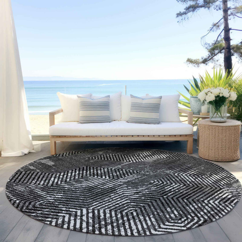 8' Black And Ivory Round Geometric Washable Indoor Outdoor Area Rug