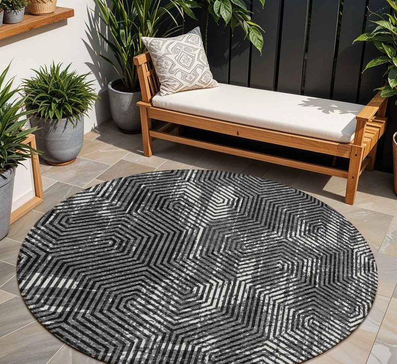 8' Black And Ivory Round Geometric Washable Indoor Outdoor Area Rug